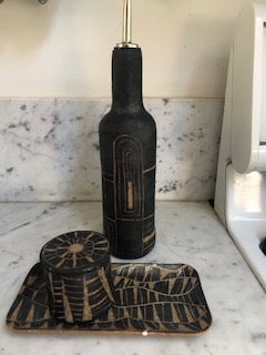 hand built olive oil bottle