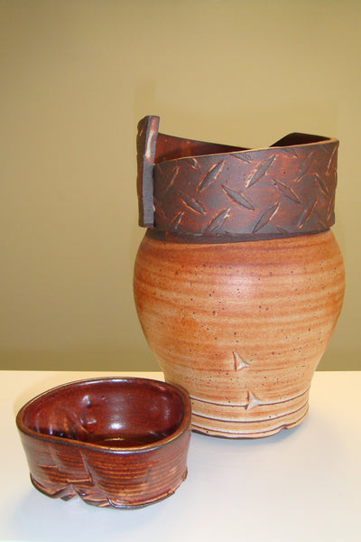 Thrown and altered pottery
