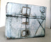 Square ceramic container.