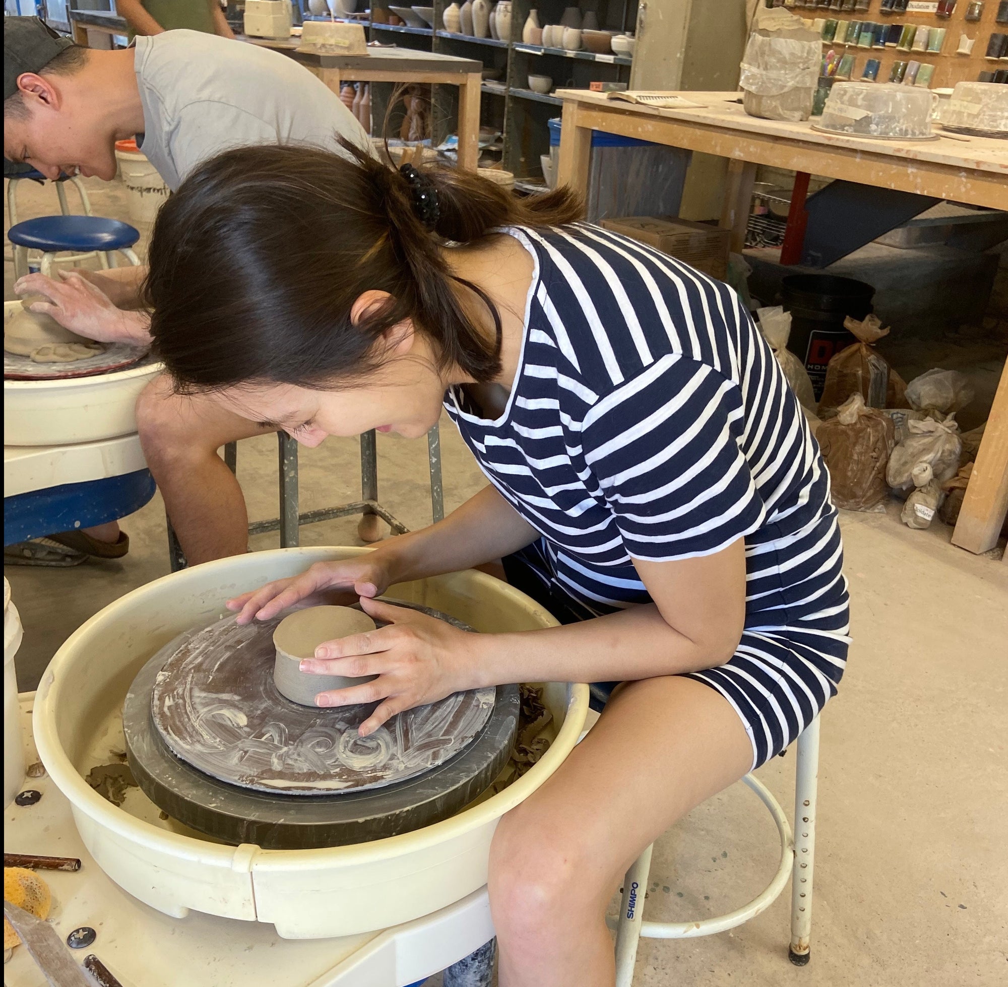 Pottery student at work